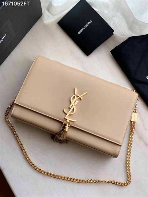 ysl beige bag with silver hardware|ysl beige bag with tassel.